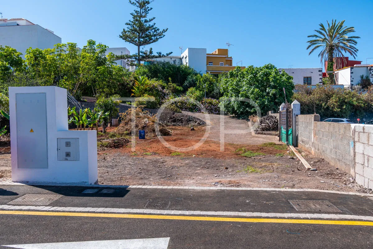 Urban plot with planned villa, pool and expansion potential in residential area
