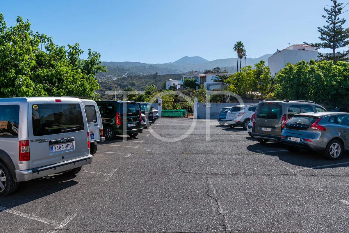 Urban plot with planned villa, pool and expansion potential in residential area