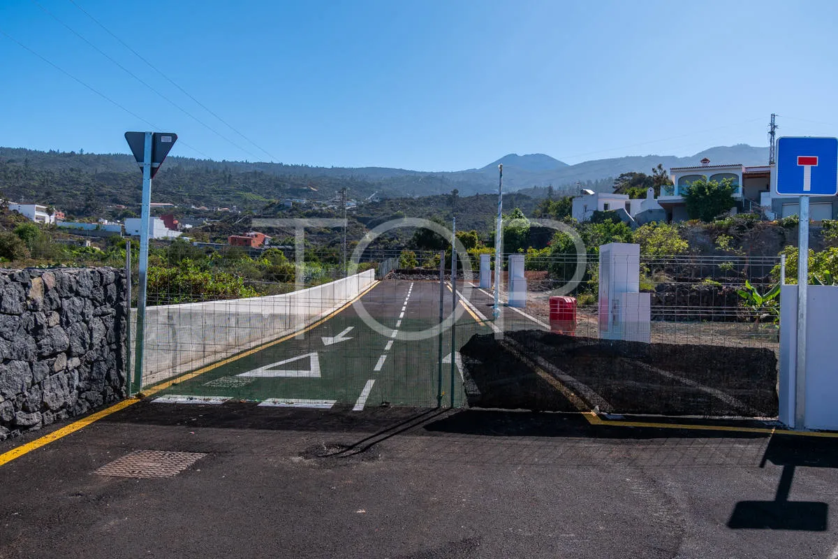 Urban plot with planned villa, pool and expansion potential in residential area