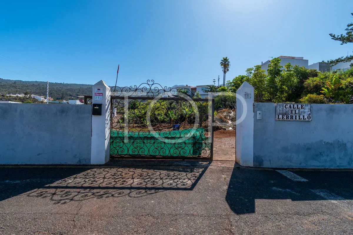 Urban plot with planned villa, pool and expansion potential in residential area