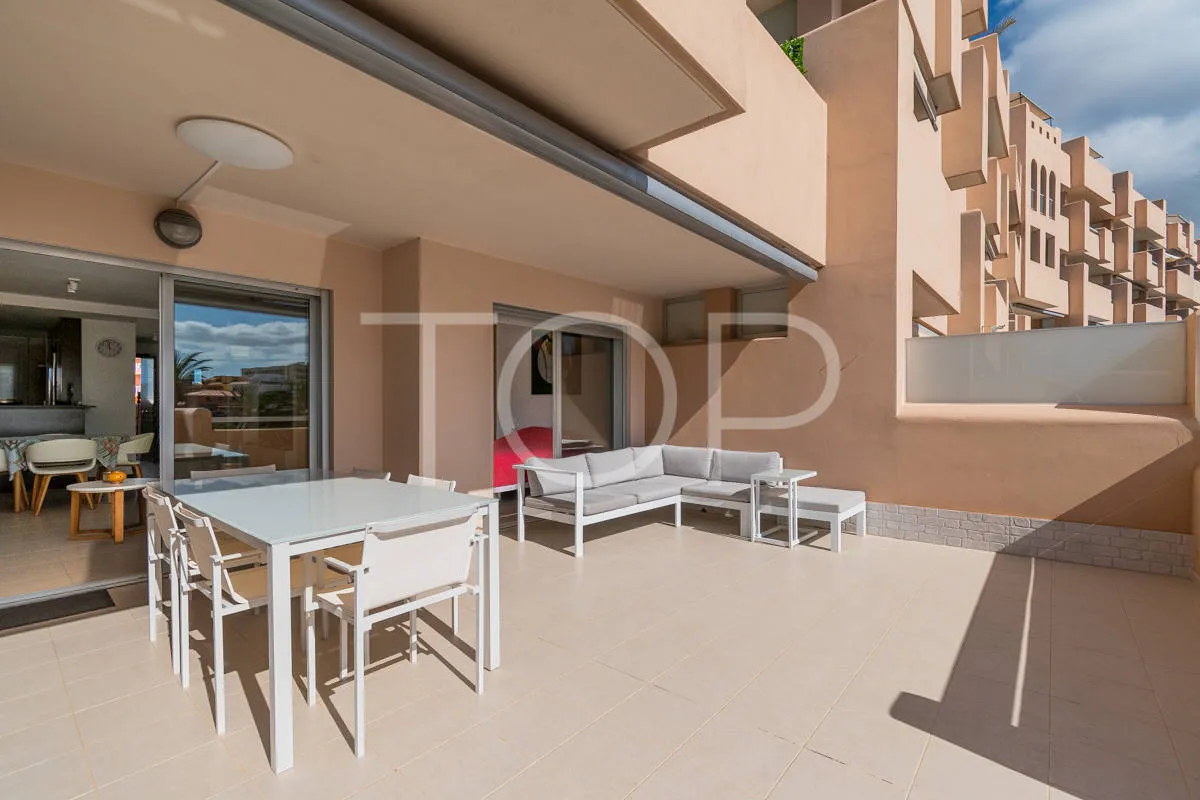 Beautiful two-bedroom apartment with large terrace and pool view in Playa Paraiso