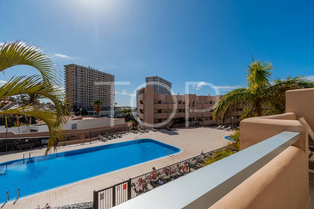 Beautiful two-bedroom apartment with large terrace and pool view in Playa Paraiso