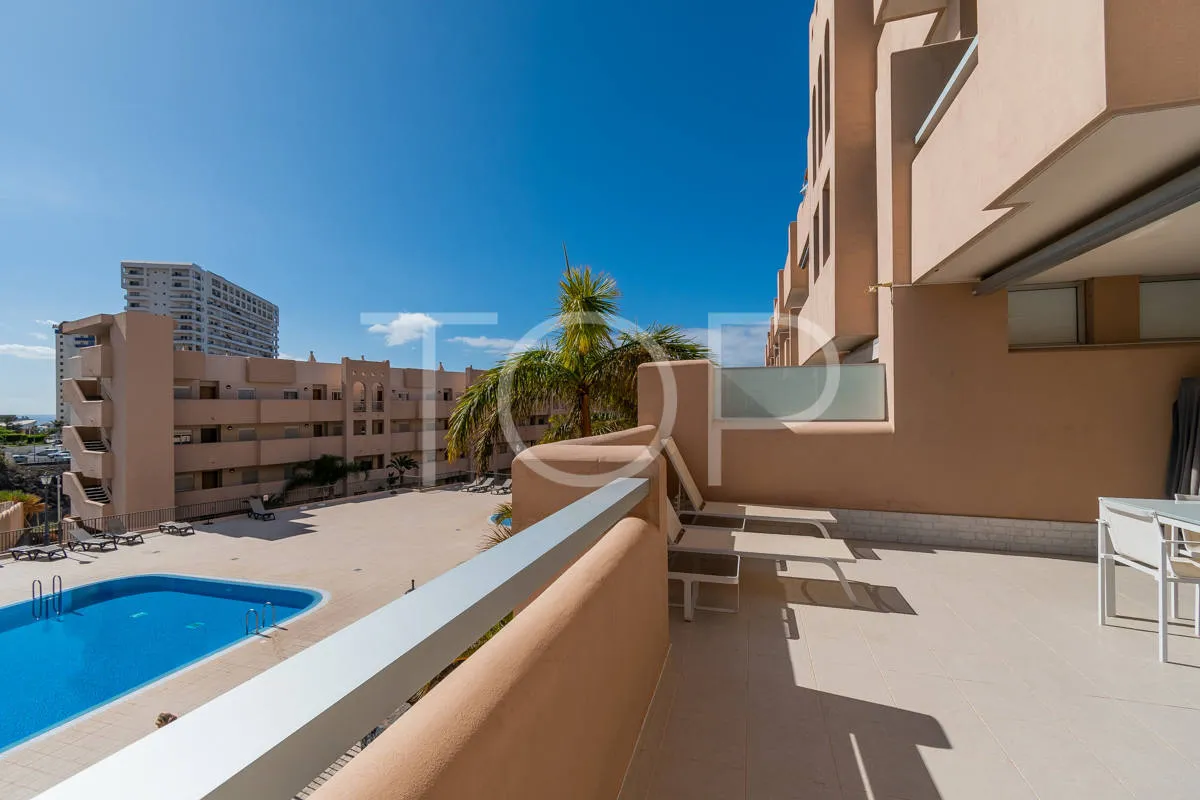 Beautiful two-bedroom apartment with large terrace and pool view in Playa Paraiso