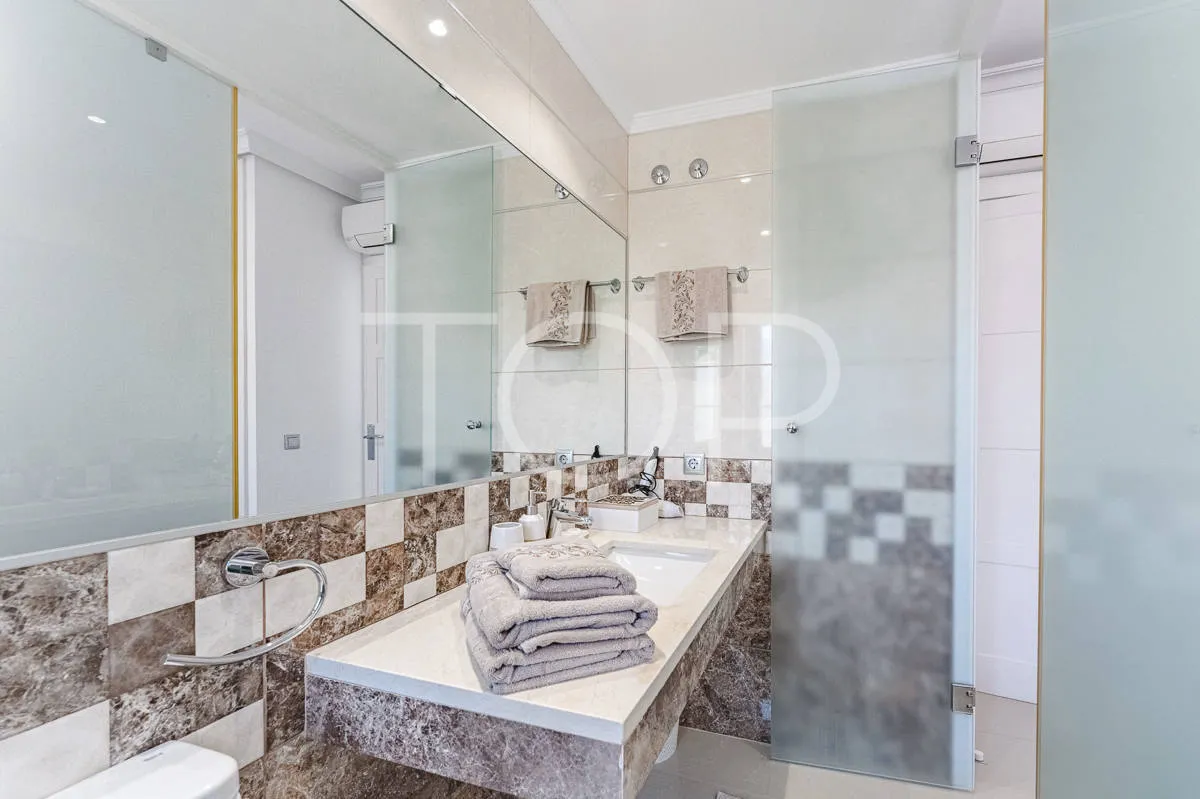 Semi-detached villa with sea views in La Caleta, just steps from the beach