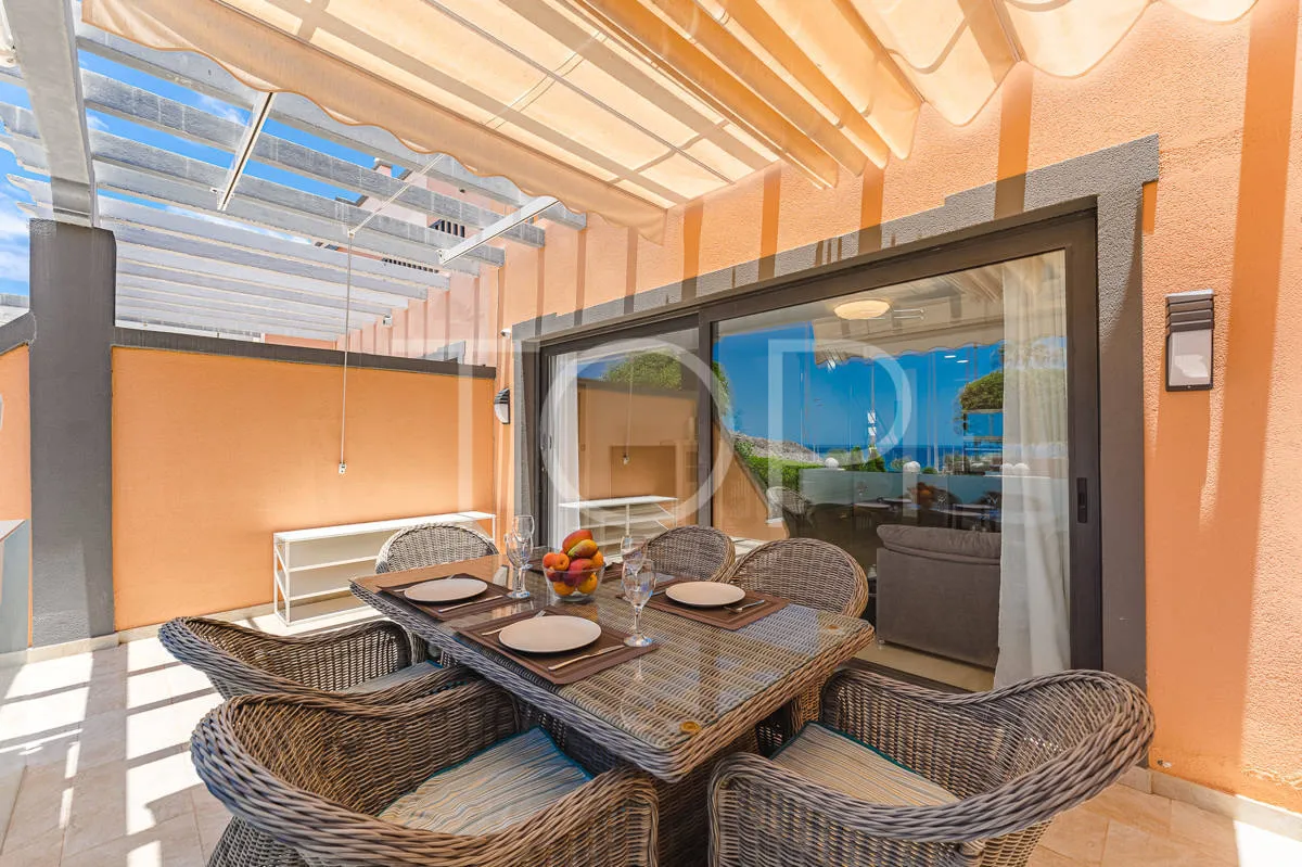 Semi-detached villa with sea views in La Caleta, just steps from the beach