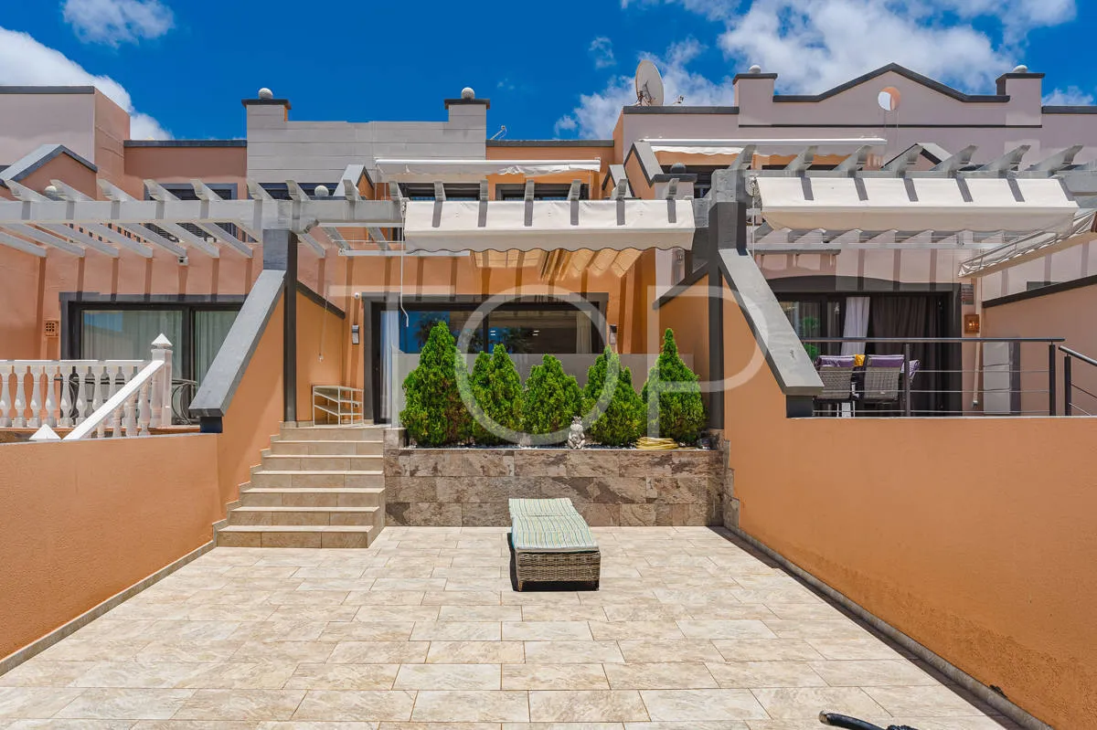Semi-detached villa with sea views in La Caleta, just steps from the beach