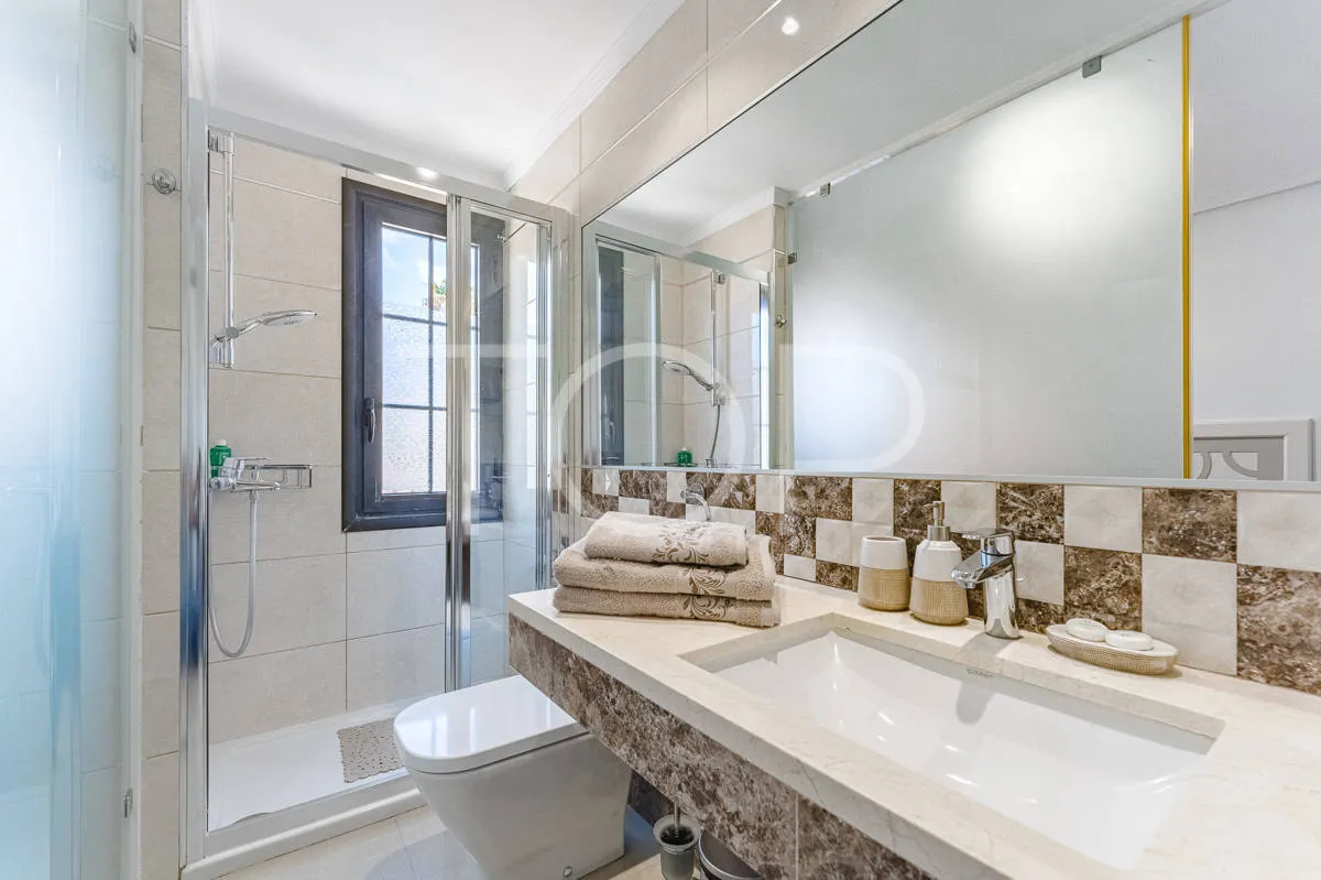 Semi-detached villa with sea views in La Caleta, just steps from the beach