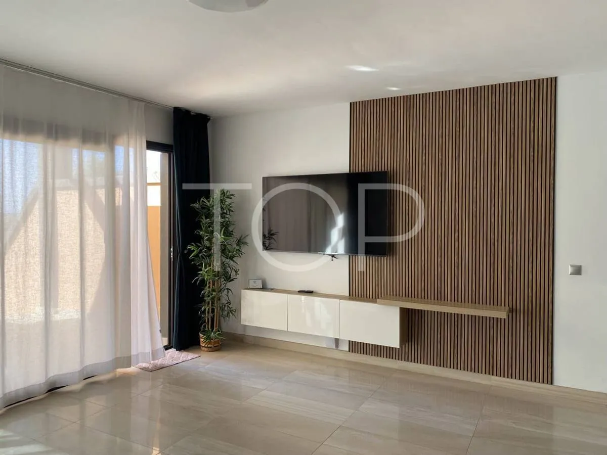Semi-detached villa with sea views in La Caleta, just steps from the beach