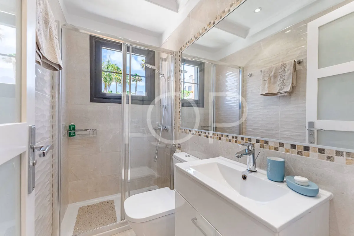Semi-detached villa with sea views in La Caleta, just steps from the beach