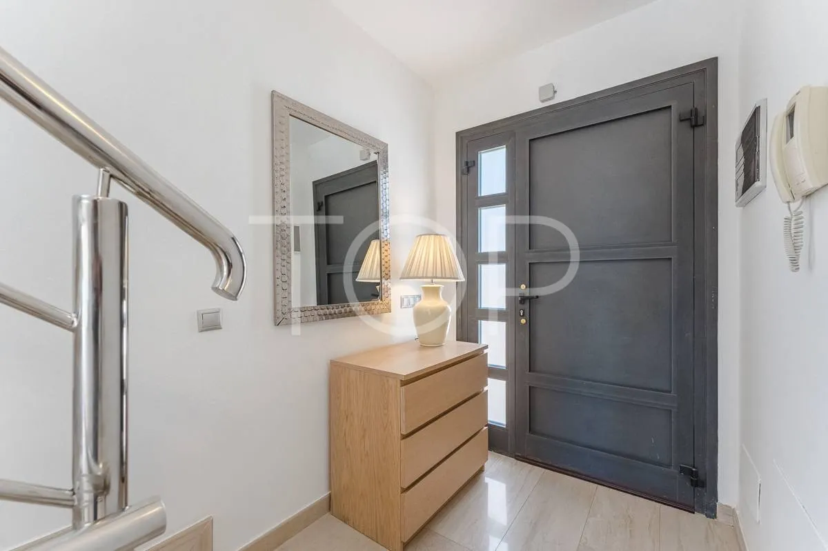 Semi-detached villa with sea views in La Caleta, just steps from the beach