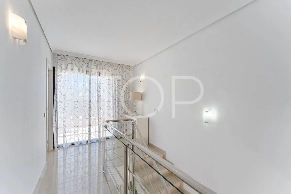 Semi-detached villa with sea views in La Caleta, just steps from the beach