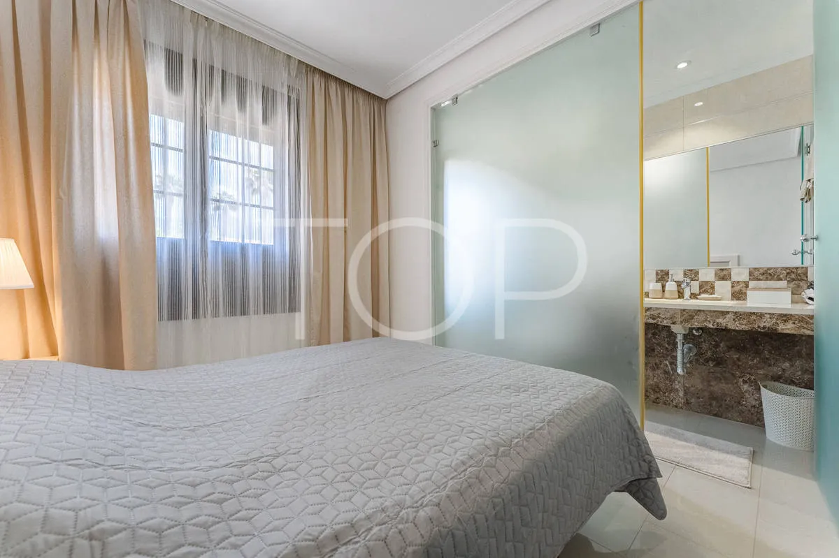 Semi-detached villa with sea views in La Caleta, just steps from the beach