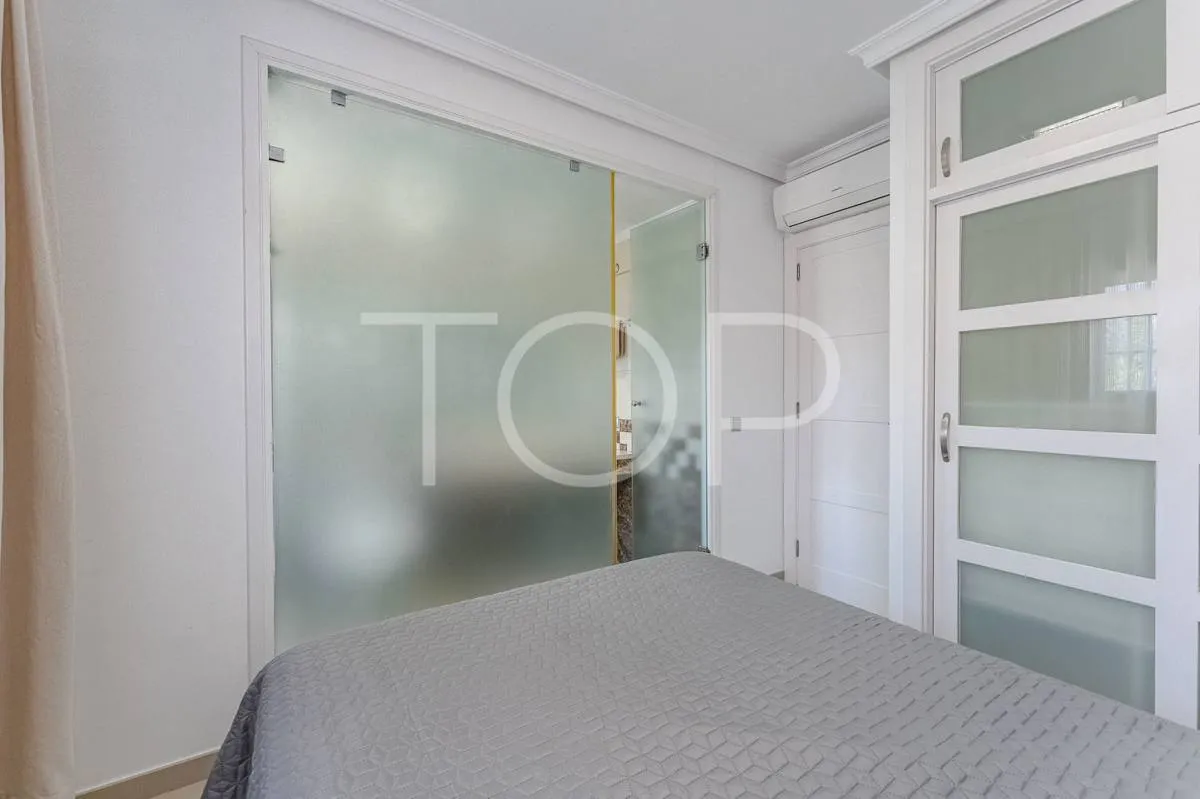 Semi-detached villa with sea views in La Caleta, just steps from the beach