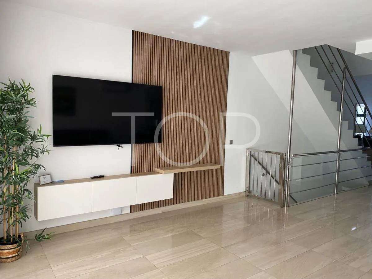 Semi-detached villa with sea views in La Caleta, just steps from the beach