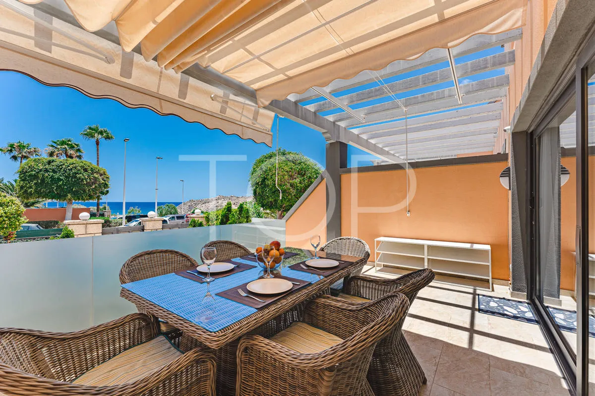 Semi-detached villa with sea views in La Caleta, just steps from the beach