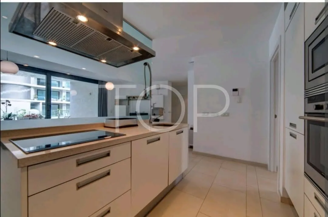 Moderno apartamento de dos dormitorios en el exclusivo complejo Las Olas en Palm-Mar, Arona