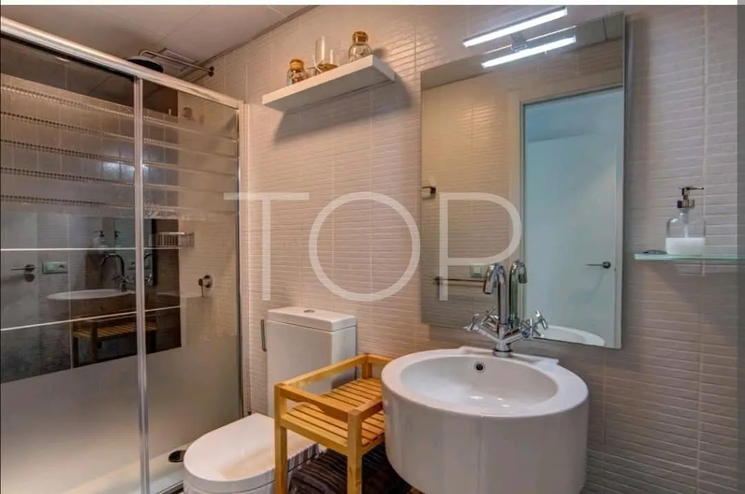 Moderno apartamento de dos dormitorios en el exclusivo complejo Las Olas en Palm-Mar, Arona