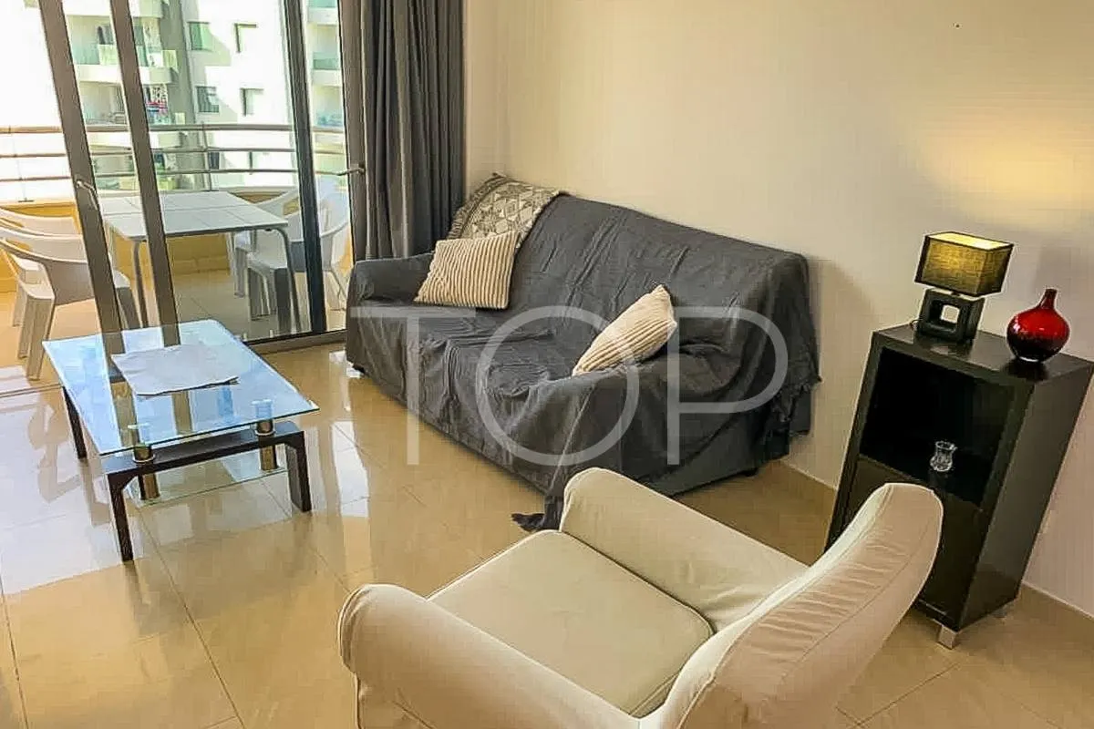 Top floor 2-bedroom apartment with partial sea views in Playa Paraiso