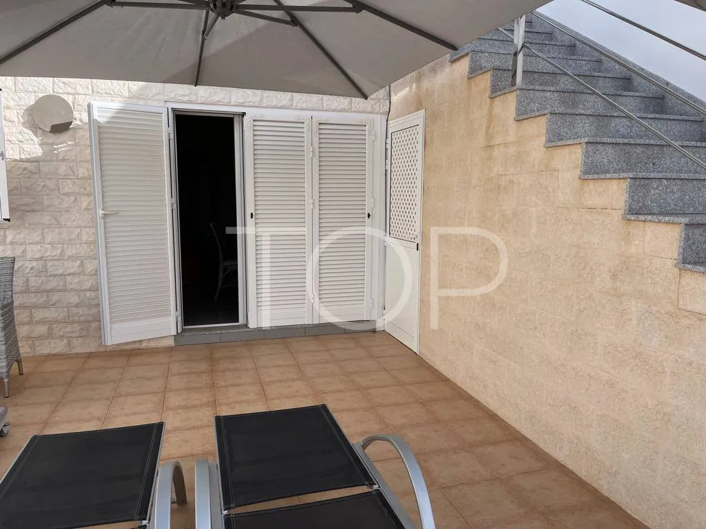 Bonita casa adosada con 3 dormitorios y amplia terraza en la tranquila zona de Las Arenas, El Médano