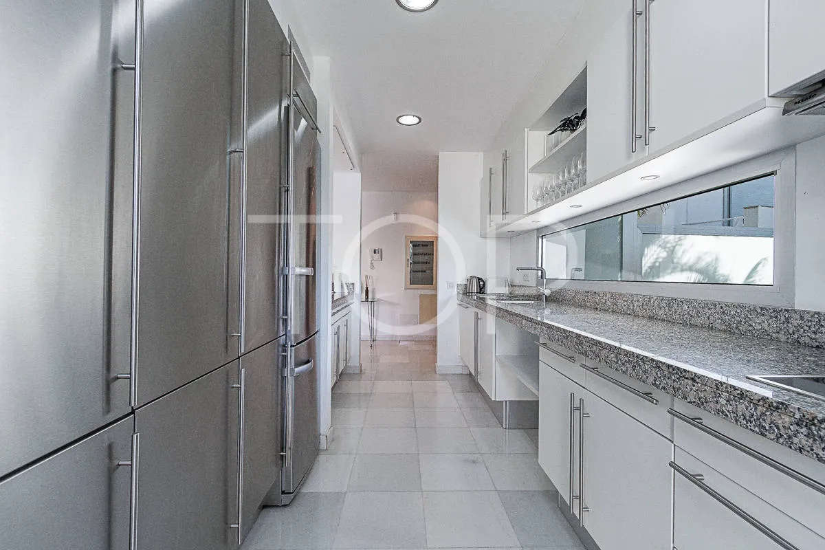 Stunning modern villa with ocean views for sale in luxury Playa del Duque area